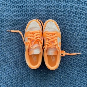 White and orange Nike dunks